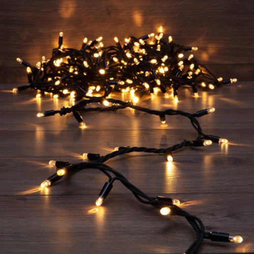 картинка Гирлянда Нить (дюраплей) 10м,  с эффектом мерцания,  черный каучук,  230В,  цвет Тёплый белый от магазина Сантехстрой