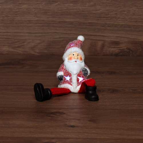 картинка Керамическая фигурка Дед Мороз с подвесными ножками 6,3х5,4х10,4 см от магазина Сантехстрой