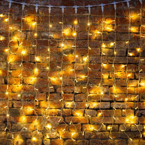 картинка Гирлянда светодиодная Занавес (Дождь),  2х3м,  600 LED ТЕПЛЫЙ БЕЛЫЙ,  прозрачный ПВХ,  IP65, постоянное свечение,  230В,  соединяется (нужен шнур питания 303-500-1) от магазина Сантехстрой