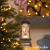картинка Новогодний фонарь Winter Glade Санта-Клаус на коньках F20-1 от магазина Сантехстрой