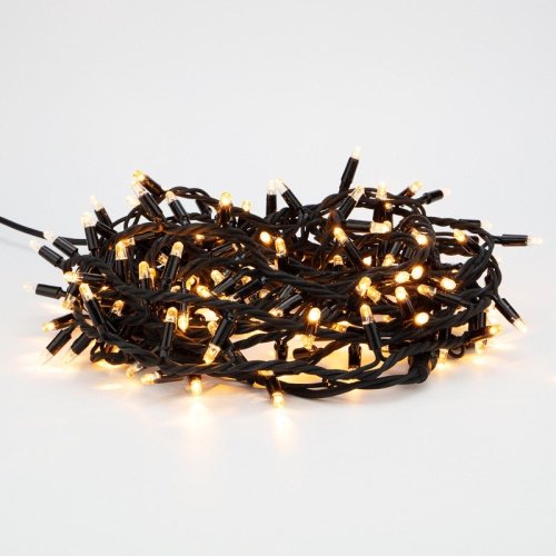 картинка Гирлянда Нить (дюраплей) 10м,  с эффектом мерцания,  черный каучук,  230В,  цвет Тёплый белый от магазина Сантехстрой