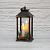 картинка Декоративный фонарь со свечкой и шишкой,  бронзовый корпус,  размер 14x14x27 см,  цвет теплый белый от магазина Сантехстрой