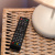 картинка Пульт универсальный для приставки DVB-T2 с функцией управления телевизором REXANT от магазина Сантехстрой