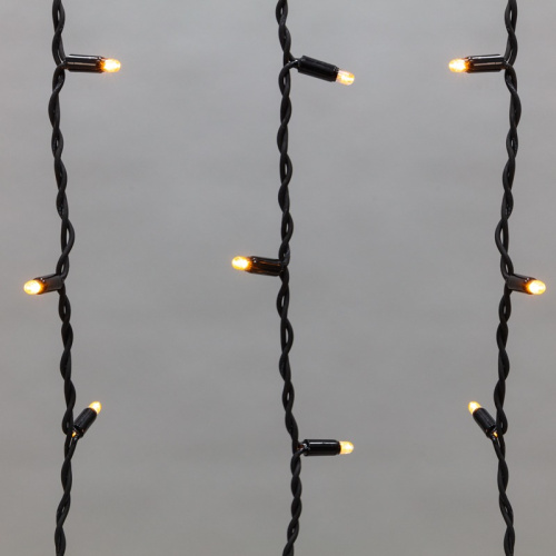 картинка Гирлянда светодиодная Бахрома (Айсикл),  5,6x0,9м,  240 LED ЖЕЛТЫЙ,  черный КАУЧУК 2,3мм,  IP67, постоянное свечение,  230В NEON-NIGHT (нужен шнур питания 315-000) от магазина Сантехстрой