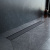 картинка W02SC-U11-070-04BM PrimeFlow Трап для душа линейный универс затвор Tile 70см цвет черн мат от магазина Сантехстрой